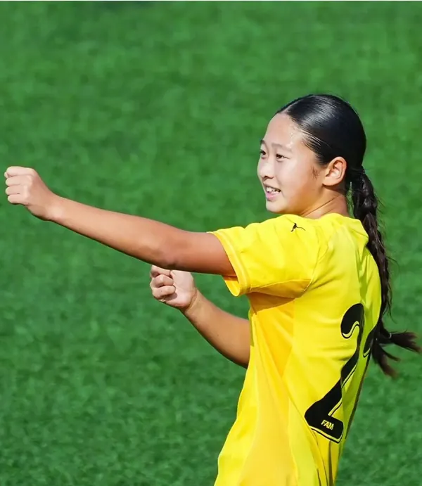 Lim You celebrating on the pitch